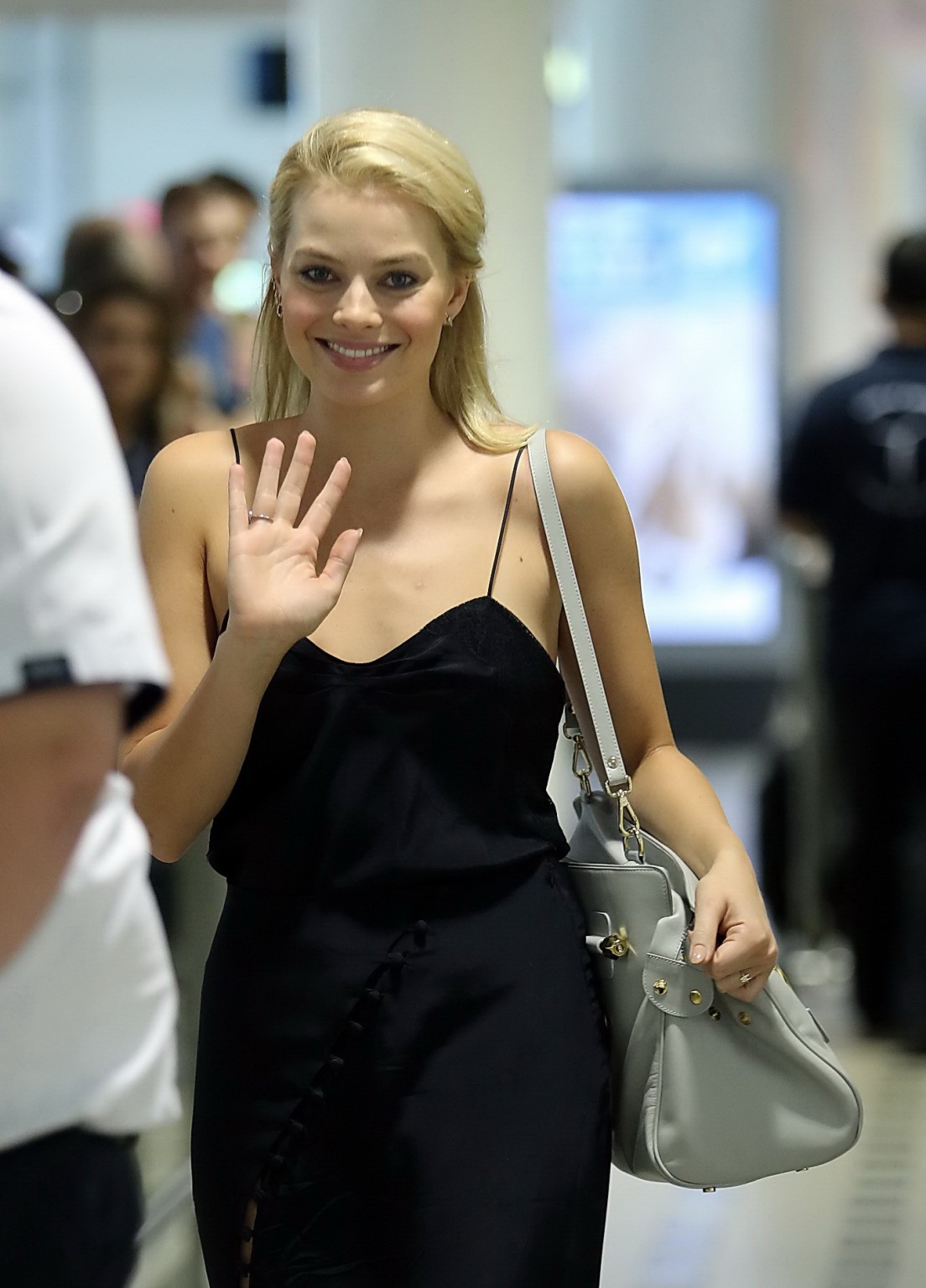 Margot Robbie cleavy and leggy wearing high slit black dress at the Brisbane Int #75206189