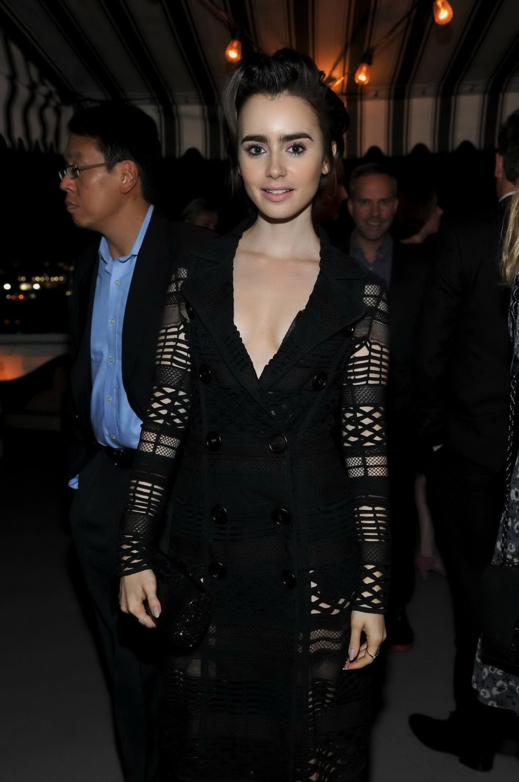 Lily Collins cleavy and leggy in a black sheer dress #75150623