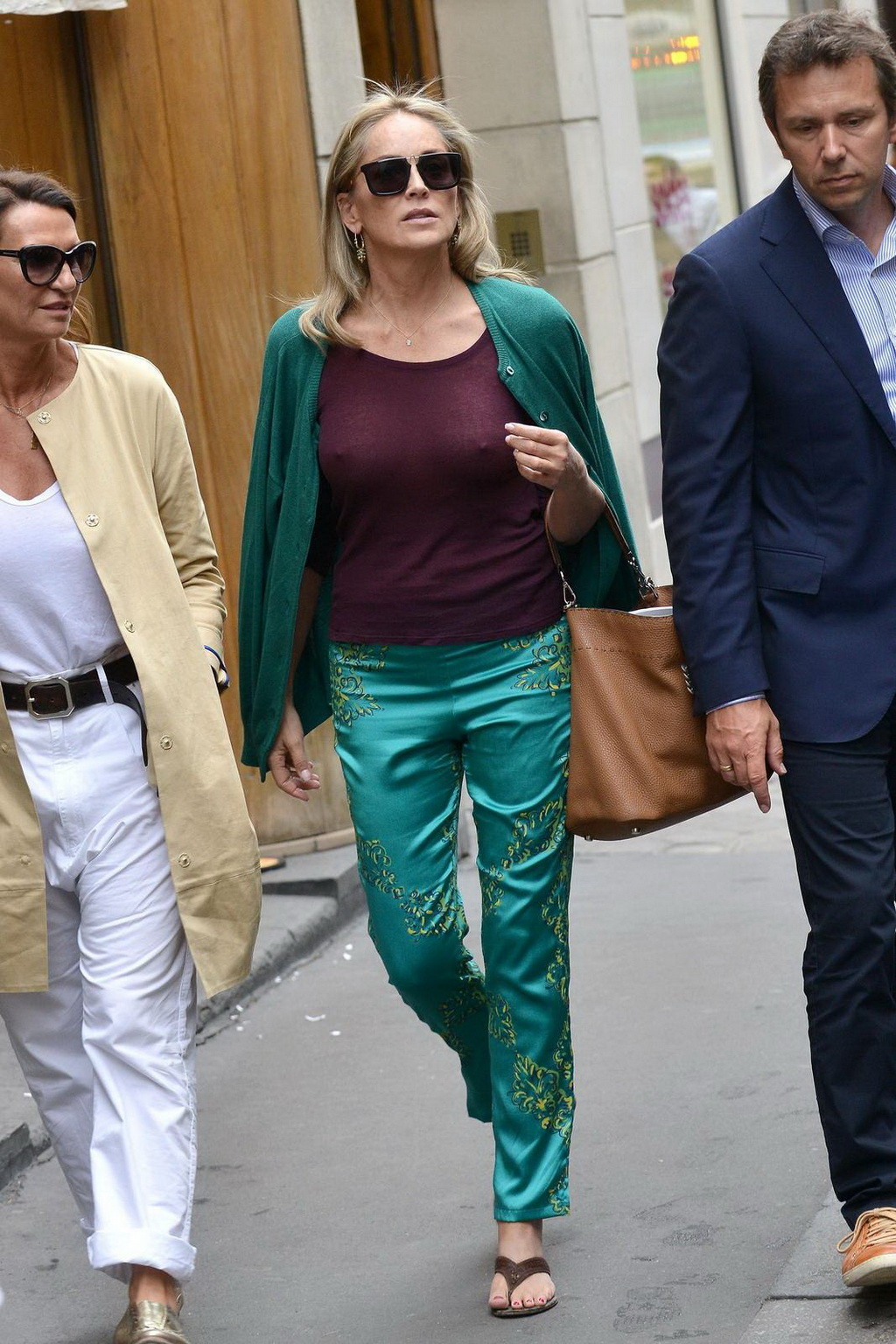 Sharon Stone showing off her huge boobs in a purple see-through top out in Paris #75225698