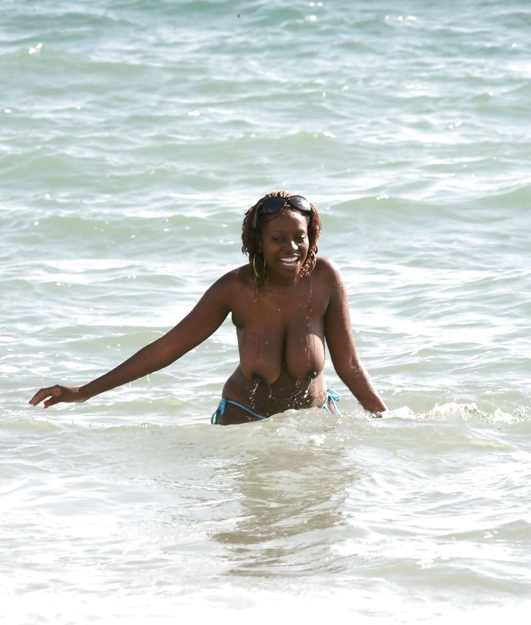 Makosi Musambasi showing her huge tits in water paparazzi pictures #75282736