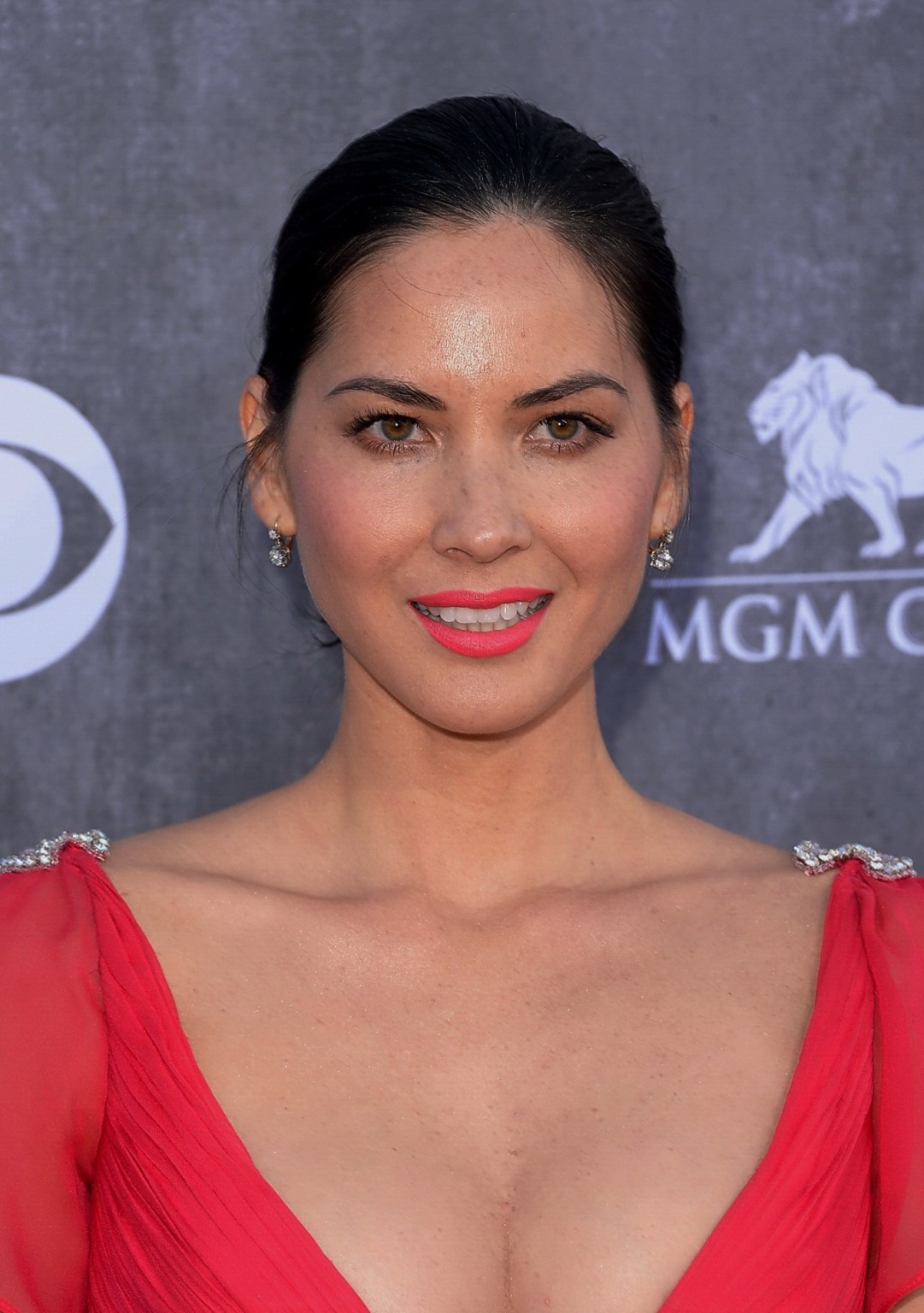 Olivia Munn braless showing huge cleavage in high slit red dress #75199807