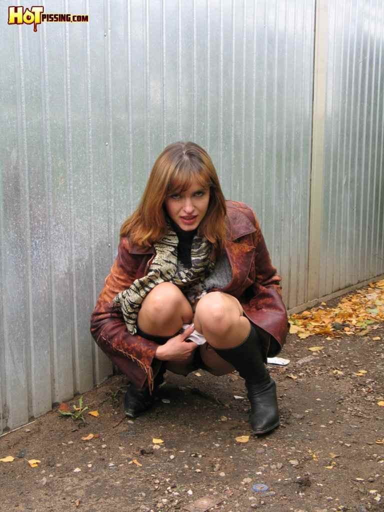 Hot redhead pissing outdoors in the winter #76592283