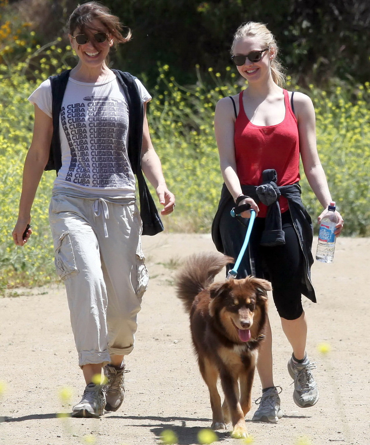 Amanda Seyfried in red tanktop  tights hiking in Griffith Park with her doggy an #75348134