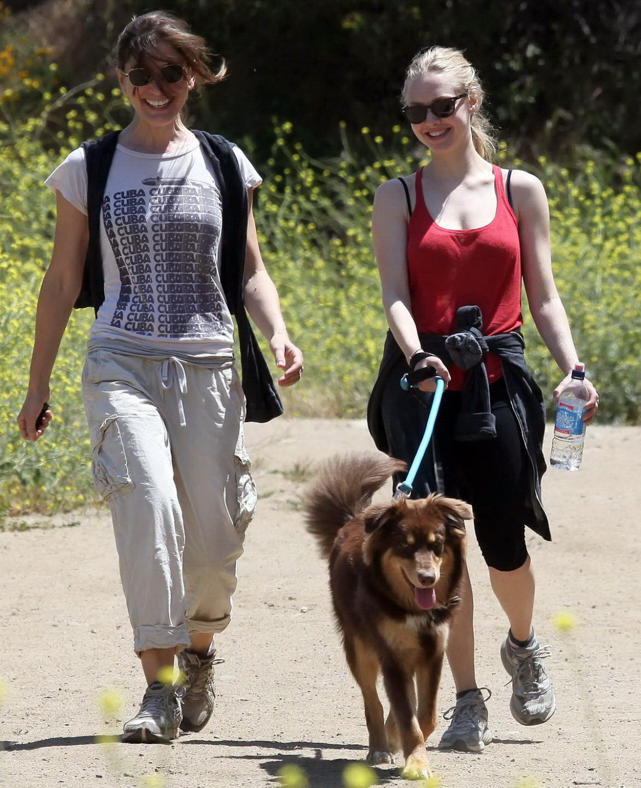 Amanda Seyfried in red tanktop  tights hiking in Griffith Park with her doggy an #75348138