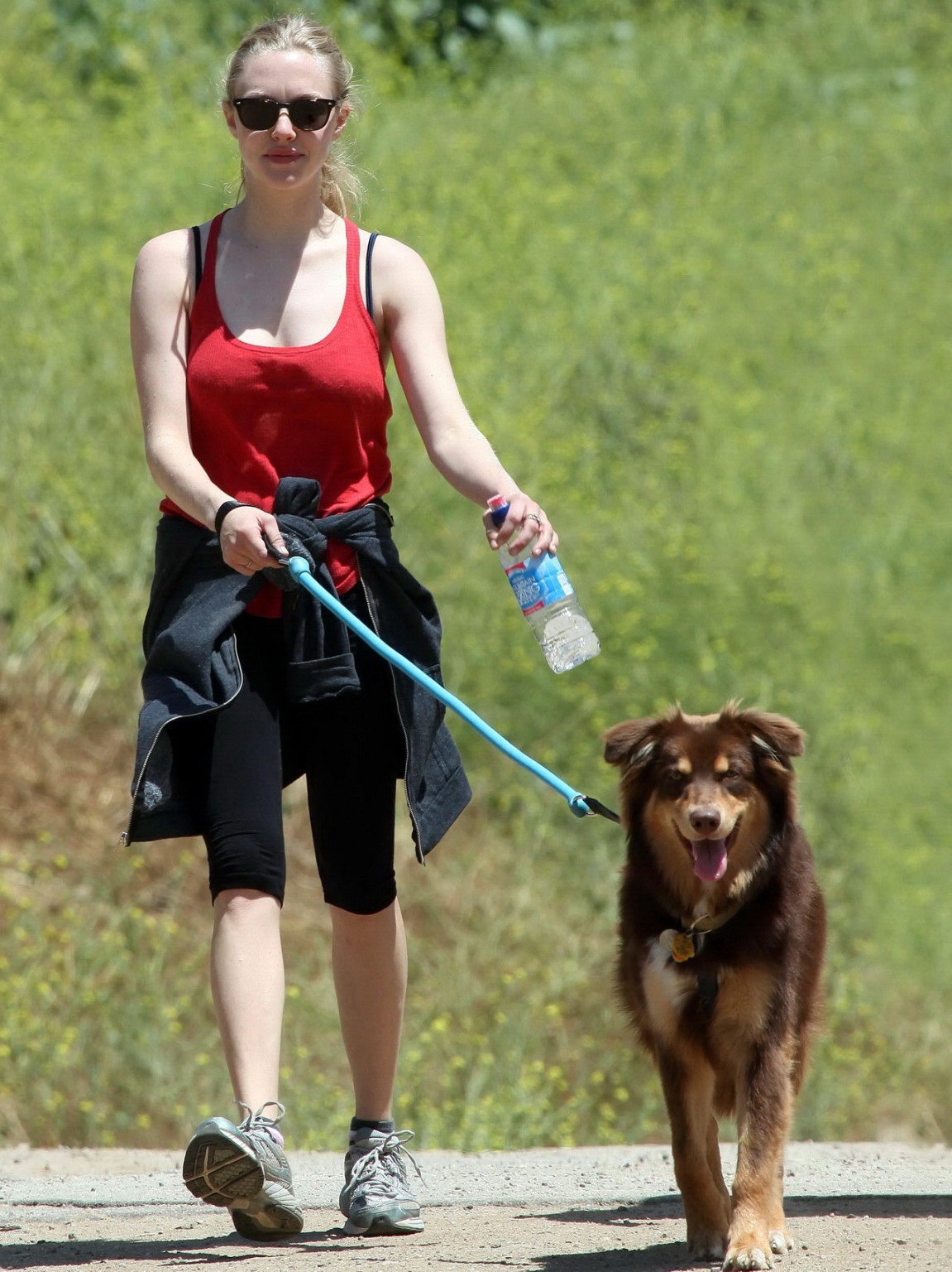 Amanda Seyfried in red tanktop  tights hiking in Griffith Park with her doggy an #75348147