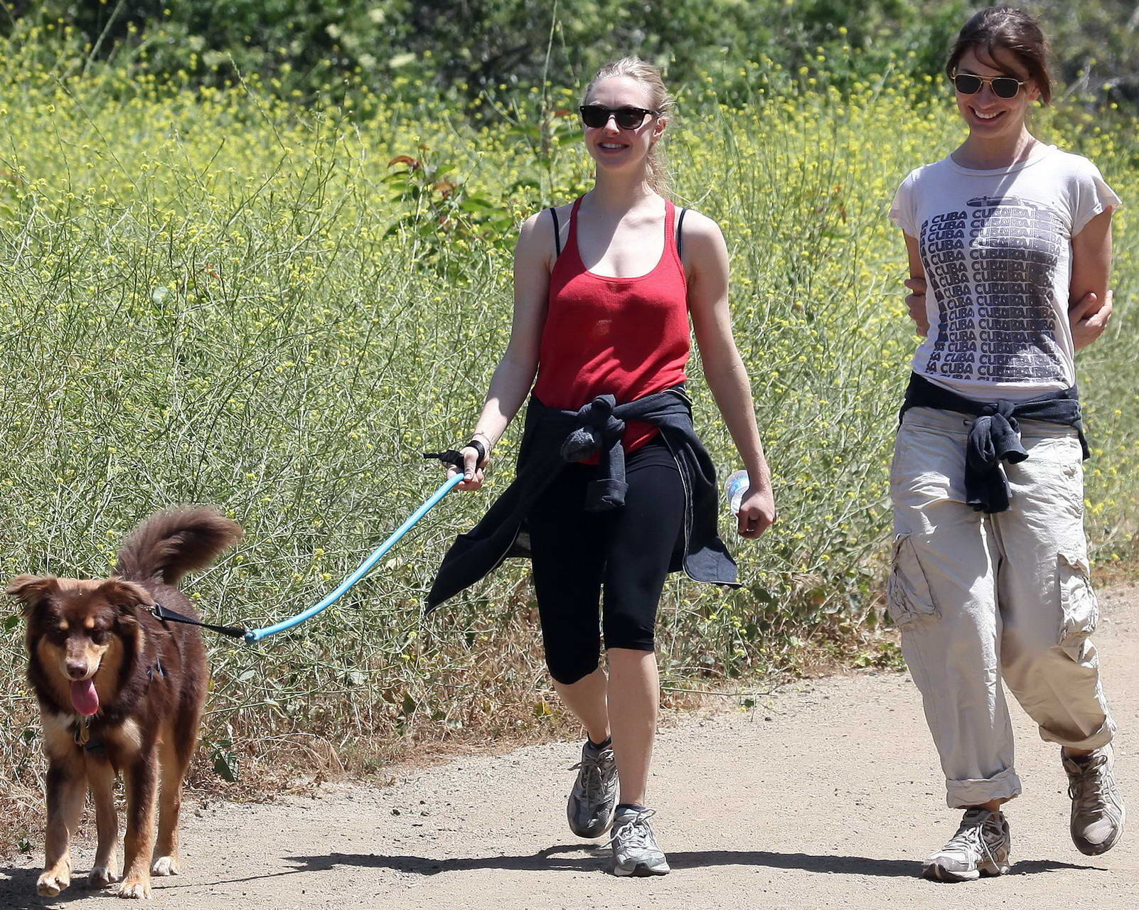 Amanda Seyfried in red tanktop  tights hiking in Griffith Park with her doggy an #75348149