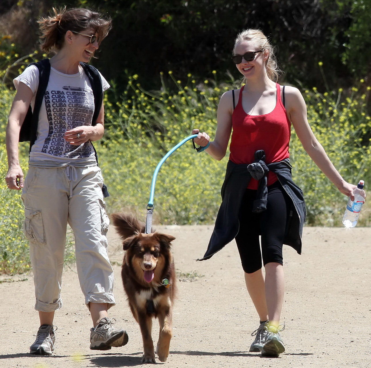 Amanda Seyfried in red tanktop  tights hiking in Griffith Park with her doggy an #75348151