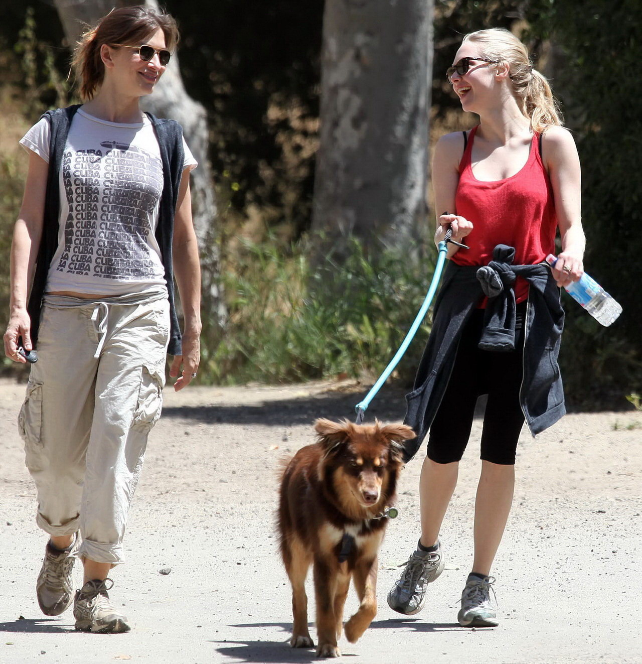 Amanda Seyfried in red tanktop  tights hiking in Griffith Park with her doggy an #75348153