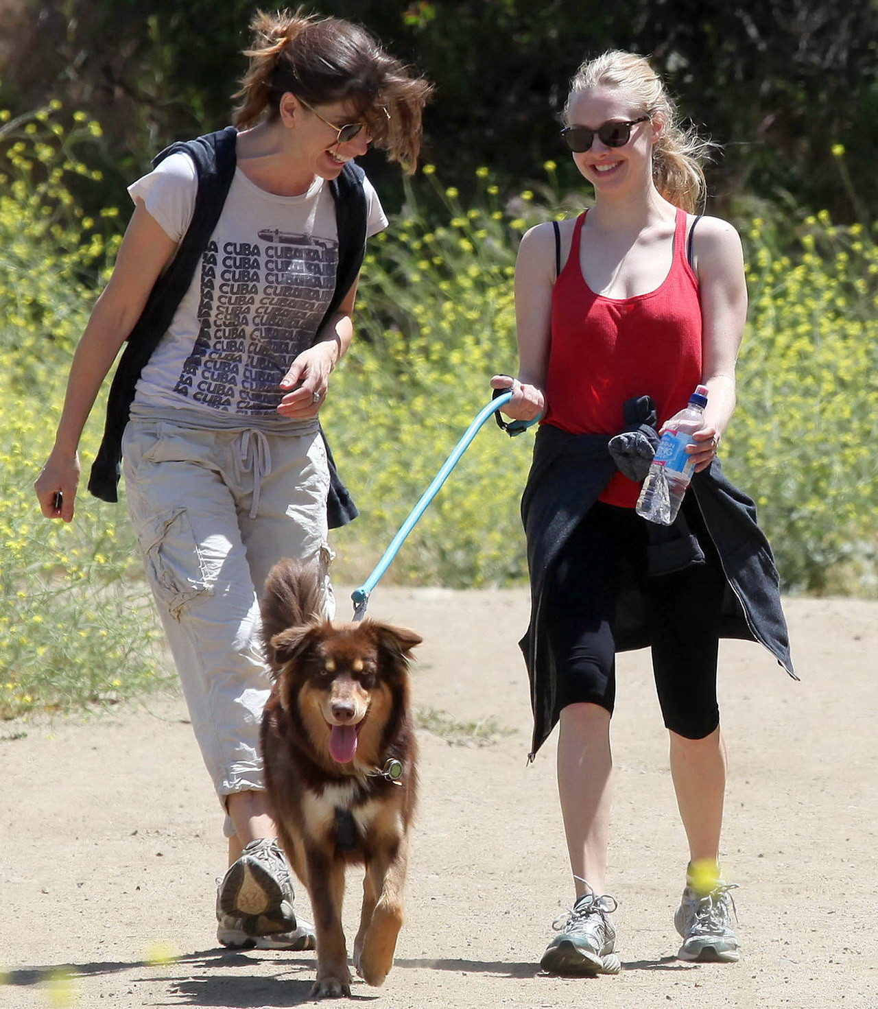 Amanda Seyfried in red tanktop  tights hiking in Griffith Park with her doggy an #75348154