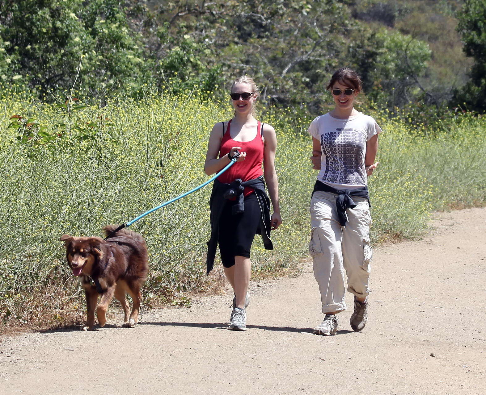 Amanda Seyfried in red tanktop  tights hiking in Griffith Park with her doggy an #75348175