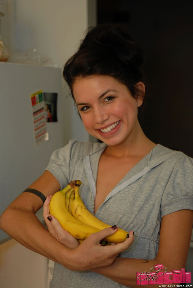 Micah Moore plays with her veggies #74809432