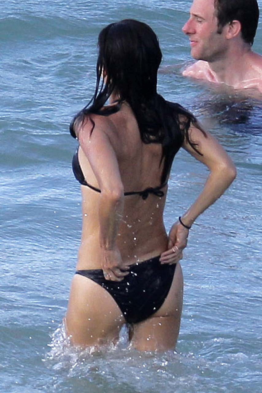 Courteney Cox nipple slip and looking very sexy in black bikini on beach paparaz #75309892
