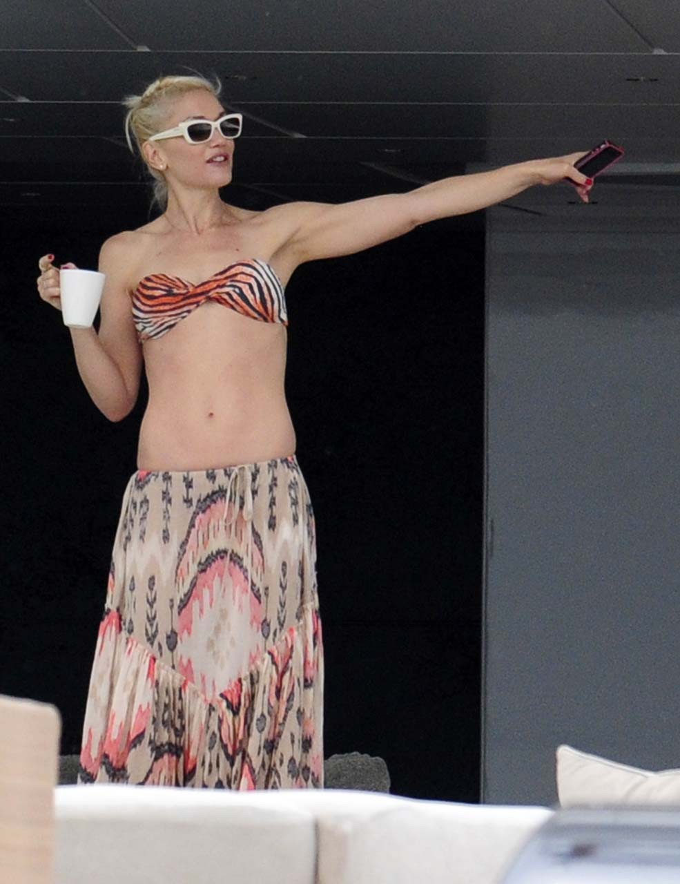 Gwen Stefani exposing sexy body and nice tits in bikini top on yacht #75304400