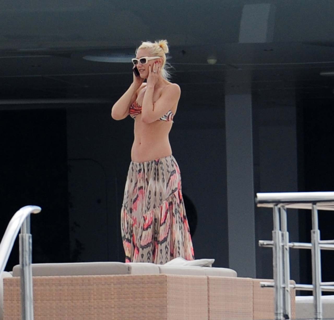 Gwen Stefani exposing sexy body and nice tits in bikini top on yacht #75304504