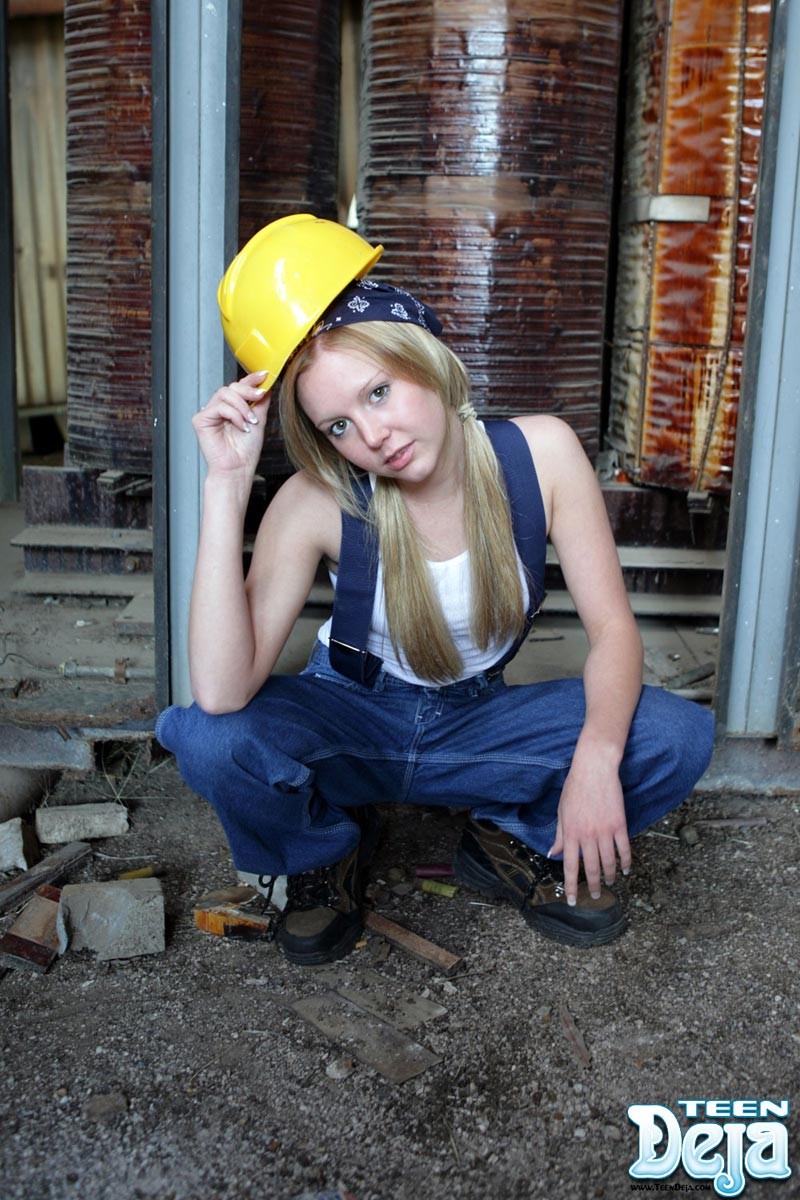 Teen girl at construction site #74630877