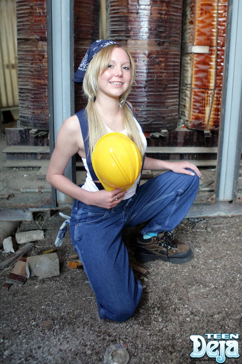 Teen girl at construction site #74630887