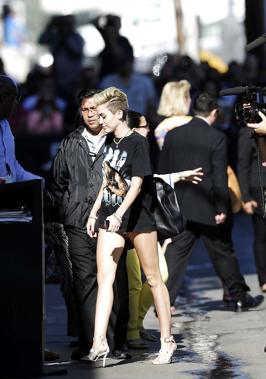 Miley Cyrus looking sexy and shows long legs on stage #75227258