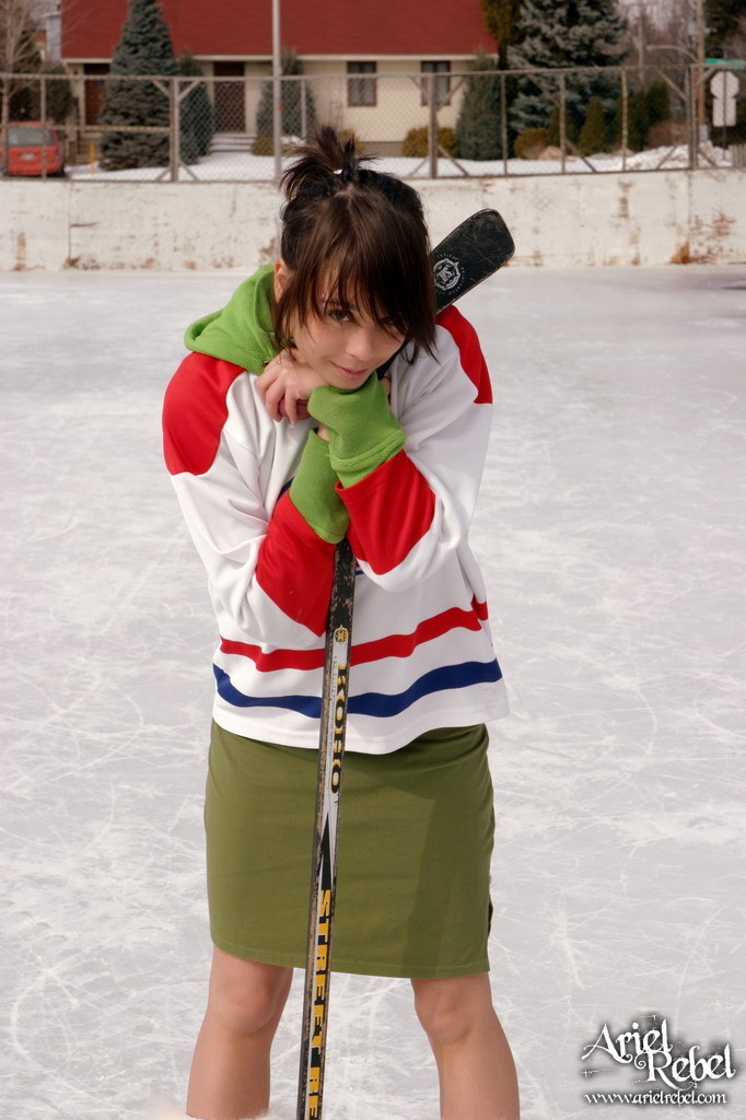 Cute teen plays hockey #67585189