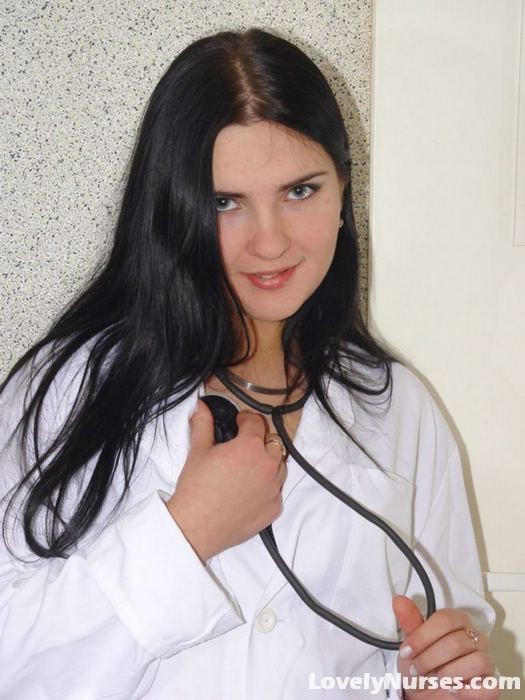 Sexy brunette nurse Alice teases us with her black stockings #71051750
