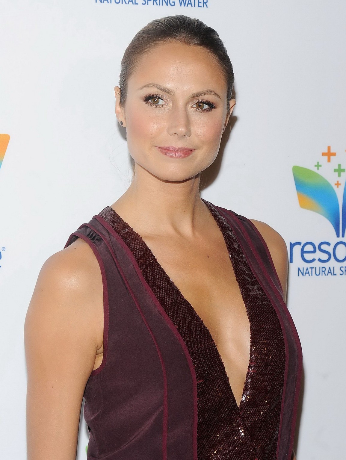 Stacy Keibler braless wearing low cut mini dress at the Natural Spring Water Res #75229482