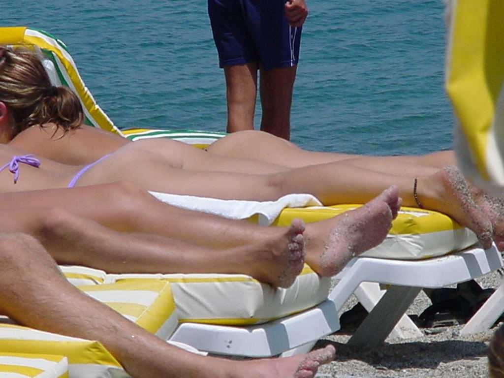 Busty blonde displays her bare human body at the nude beach front #72252892