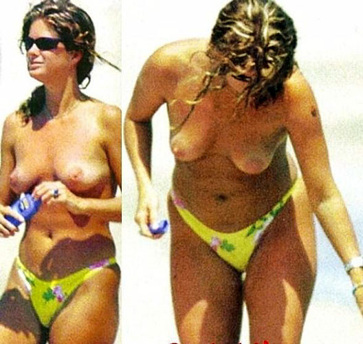 Rachel hunter che mostra le sue belle grandi tette sulla spiaggia
 #75404635