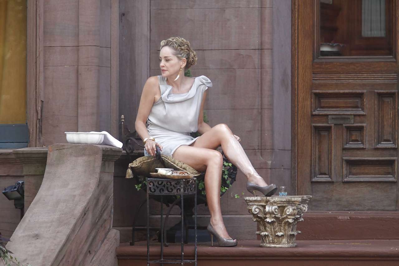Sharon Stone showing her panties upskirt while spread cream on her legs #75286212