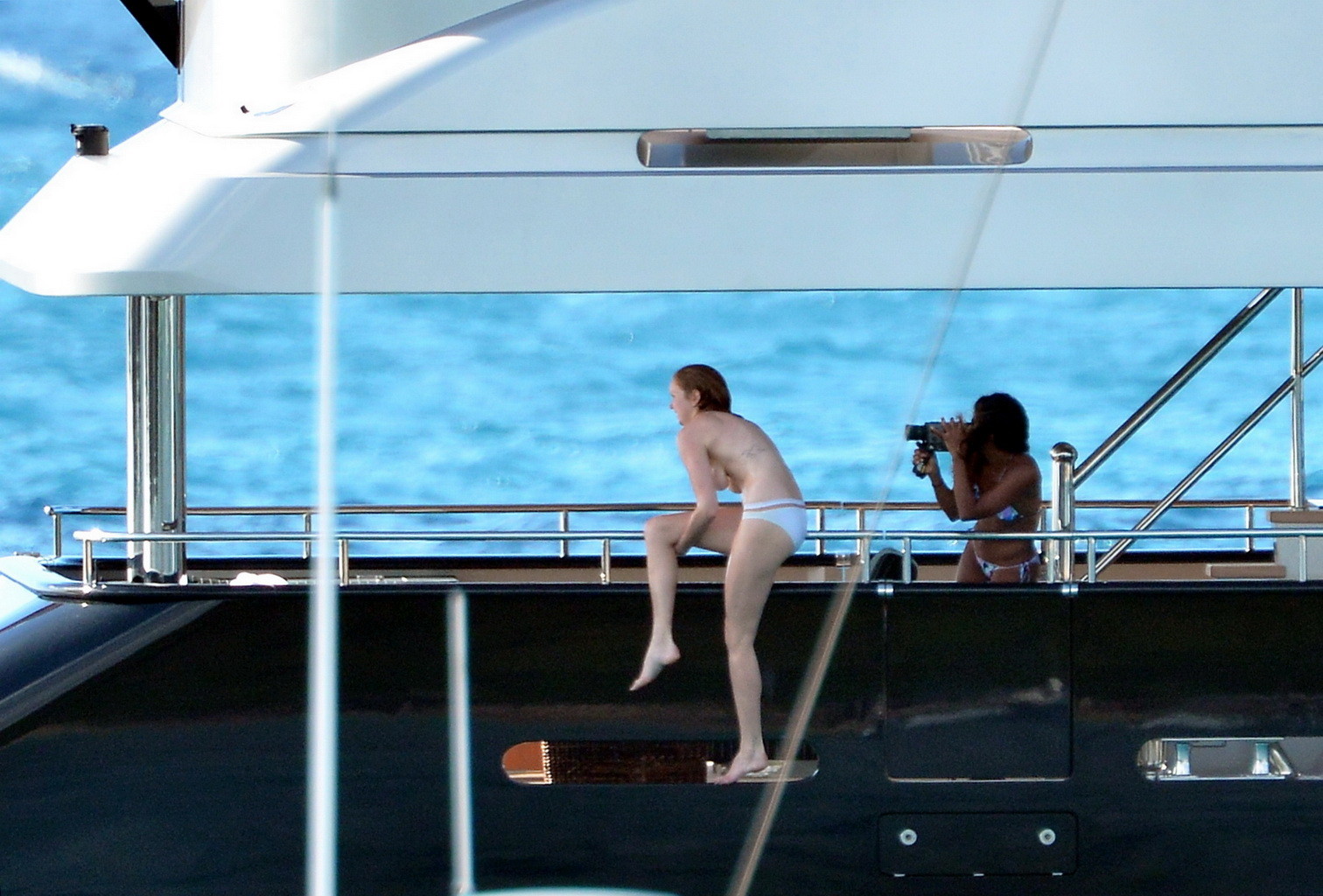 Busty Lily Cole diving topless from a yacht in St. Barts #75244497