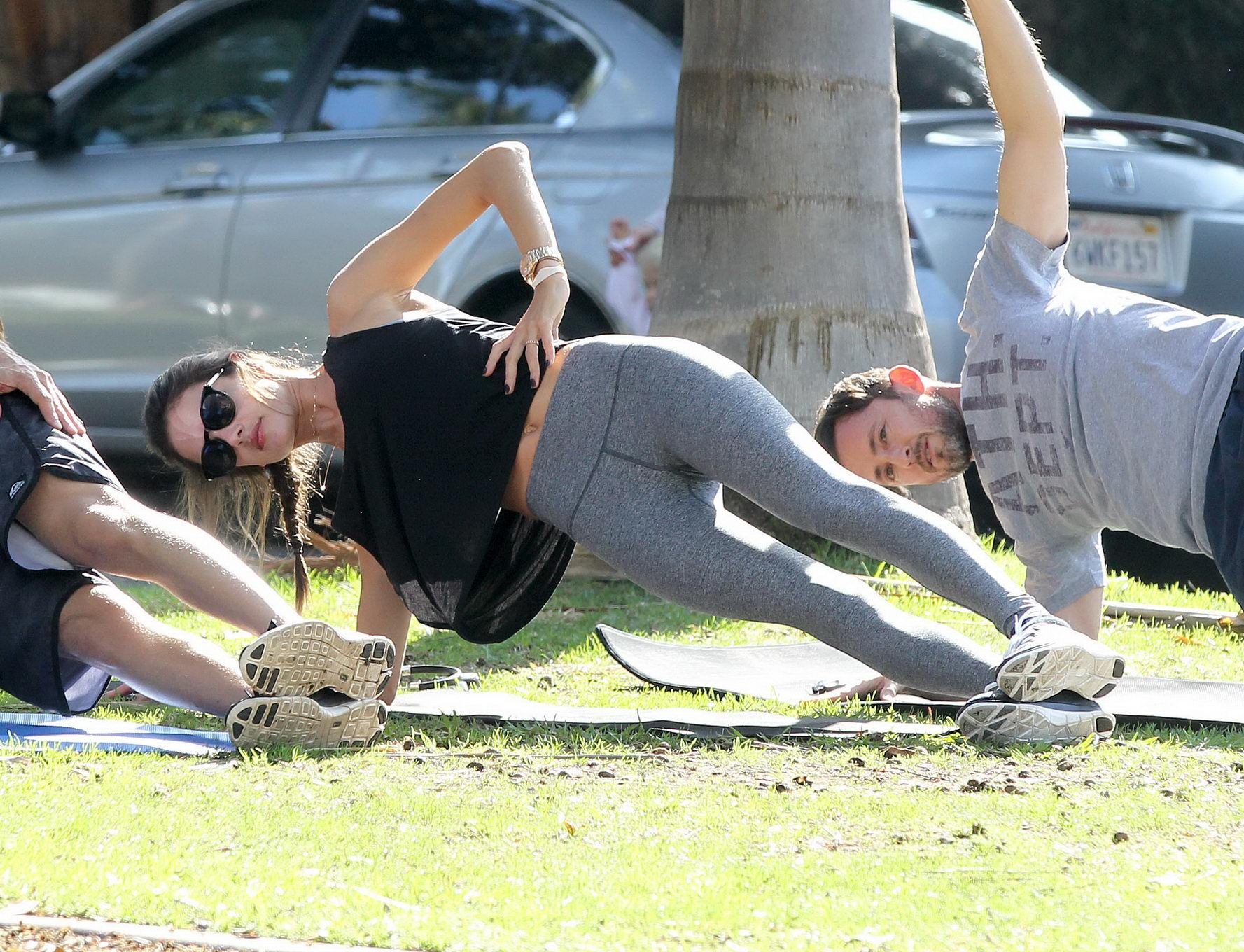 Alessandra Ambrosio shows off her ass in tights while working out at a park in S #75178979