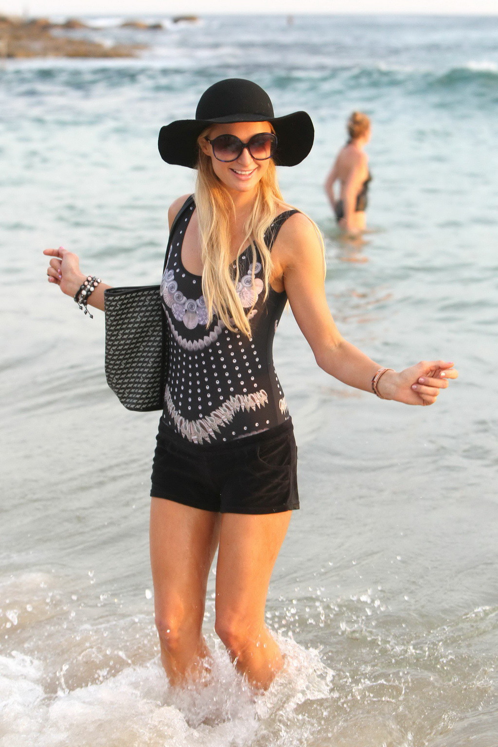 Paris Hilton showing her beautiful body in shorts and top at Bondi Beach in Sydn #75267794