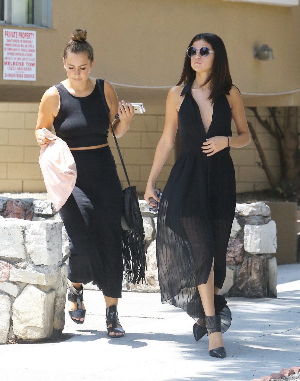 Selena Gomez shows pokies braless in wide open black transparent dress out in LA #75187889