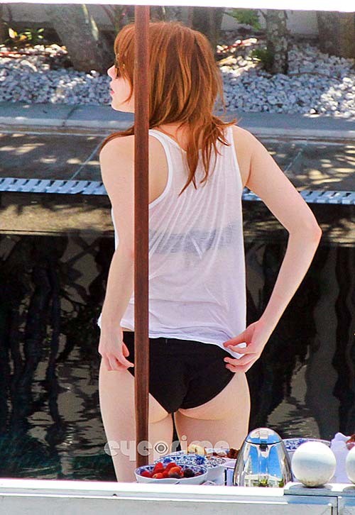 Emma Stone flashing her sexy ass in black bikini on pool #75274409