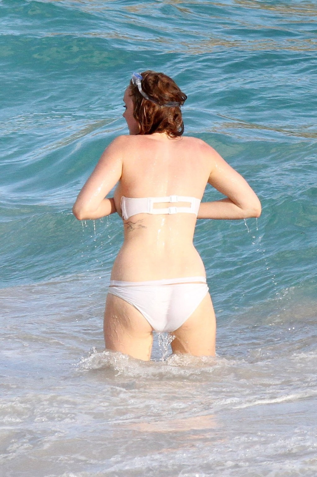 Busty Lily Cole tube bikini malfunction on a beach in St. Barts #75244766