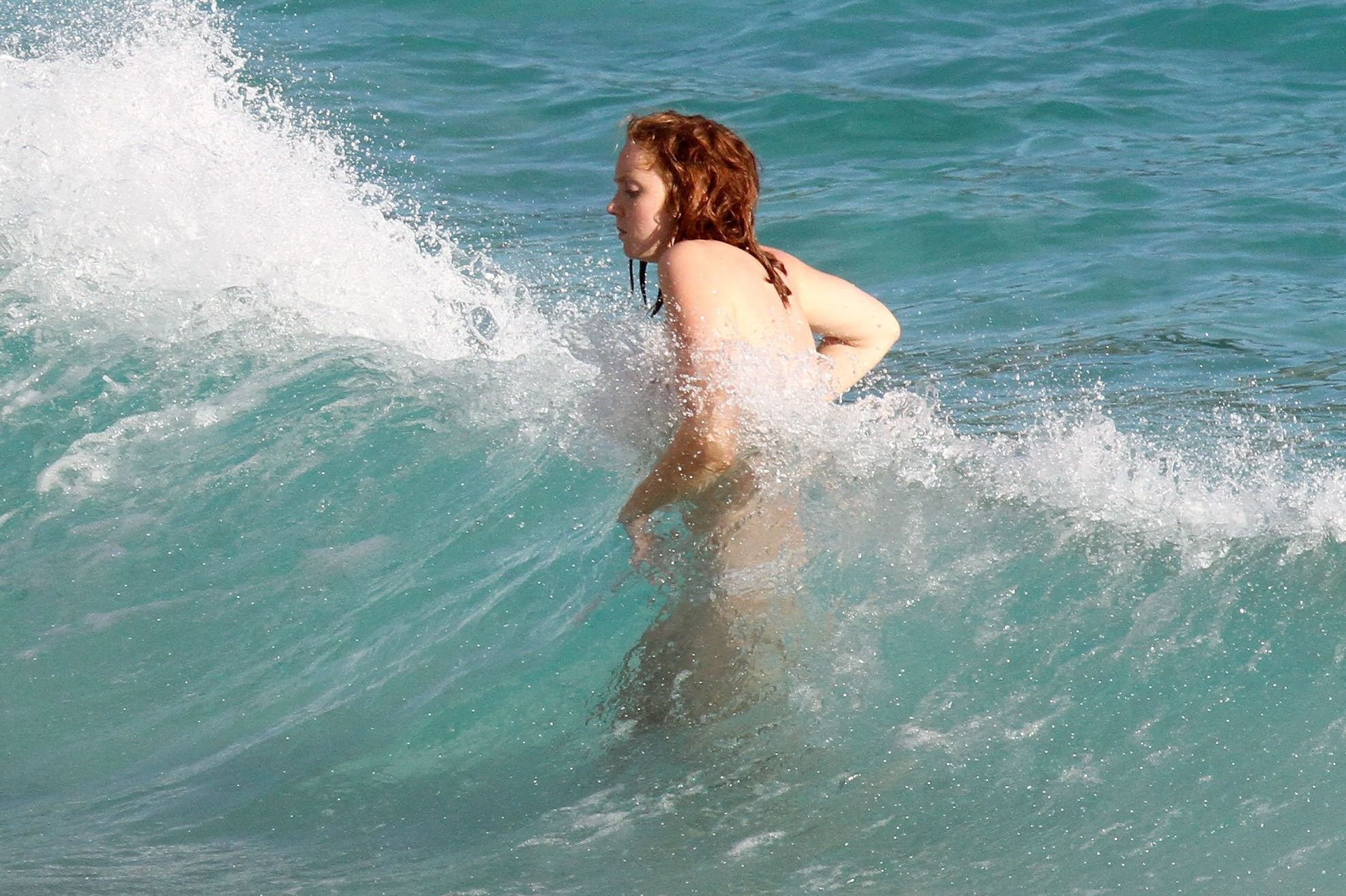 Busty Lily Cole tube bikini malfunction on a beach in St. Barts #75244839