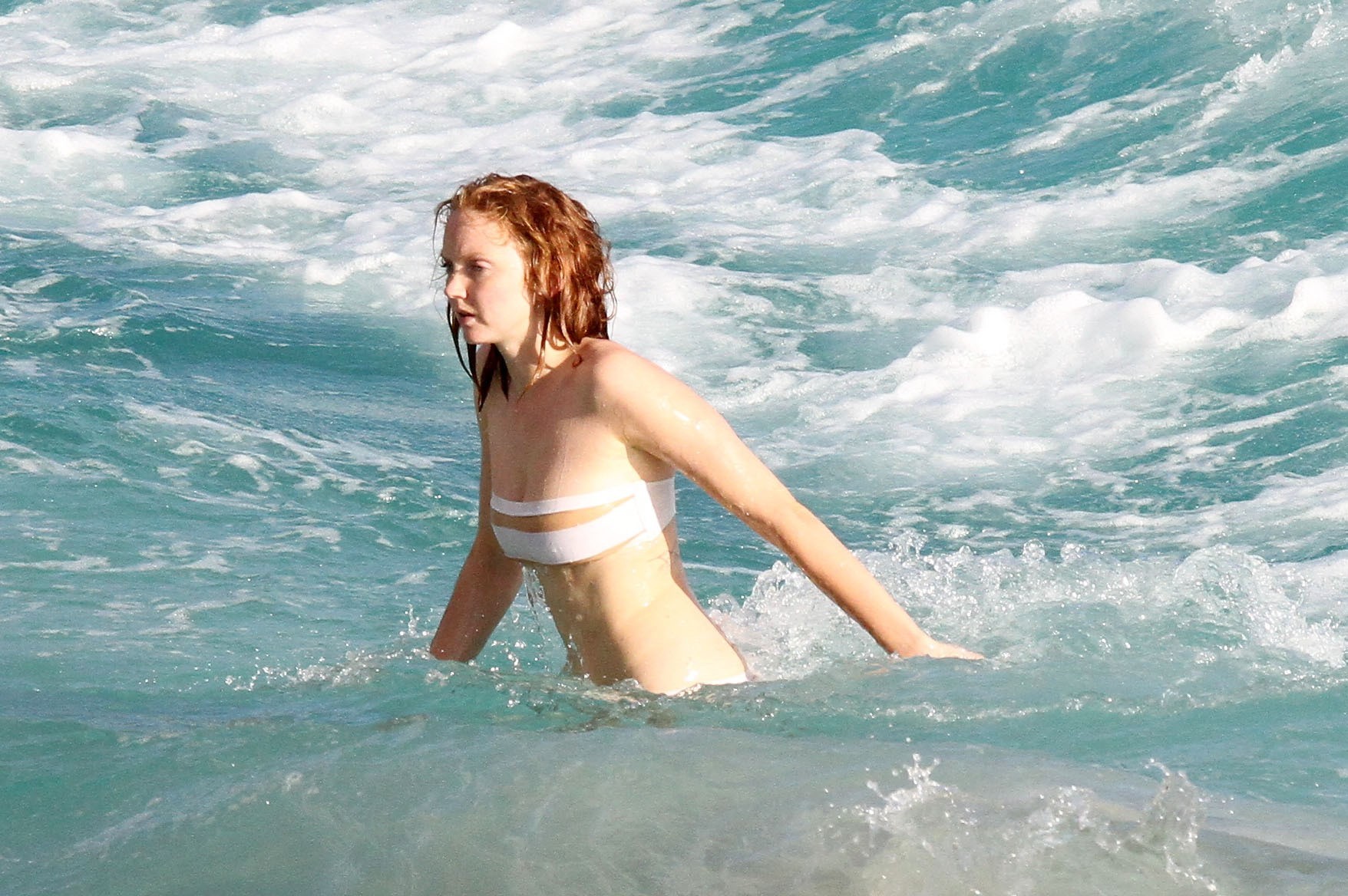 Busty Lily Cole tube bikini malfunction on a beach in St. Barts #75244844