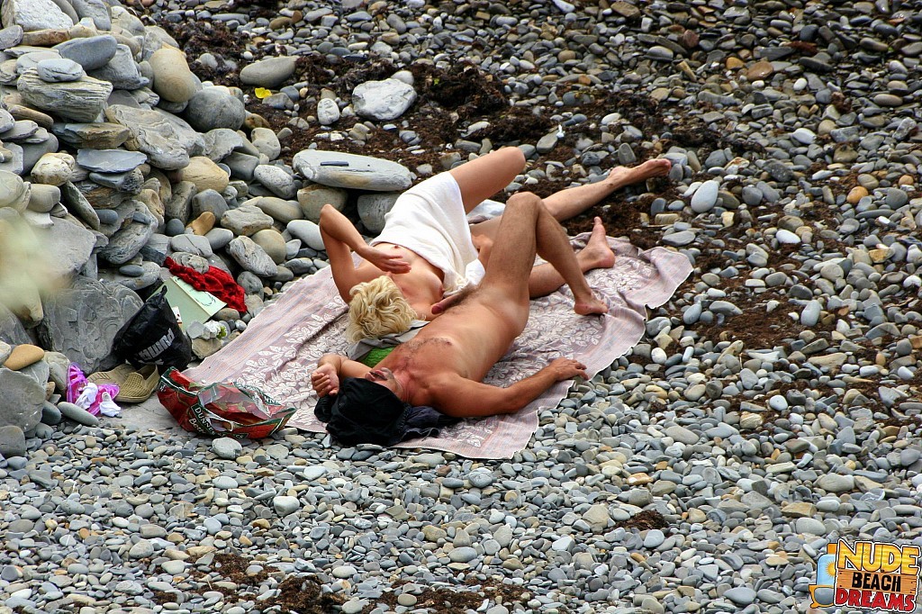 Totally naked couples enjoy on the beach #67306501