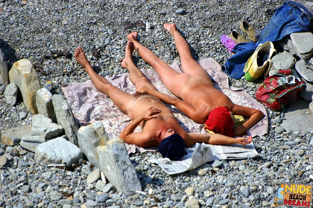 Totally naked couples enjoy on the beach #67306572