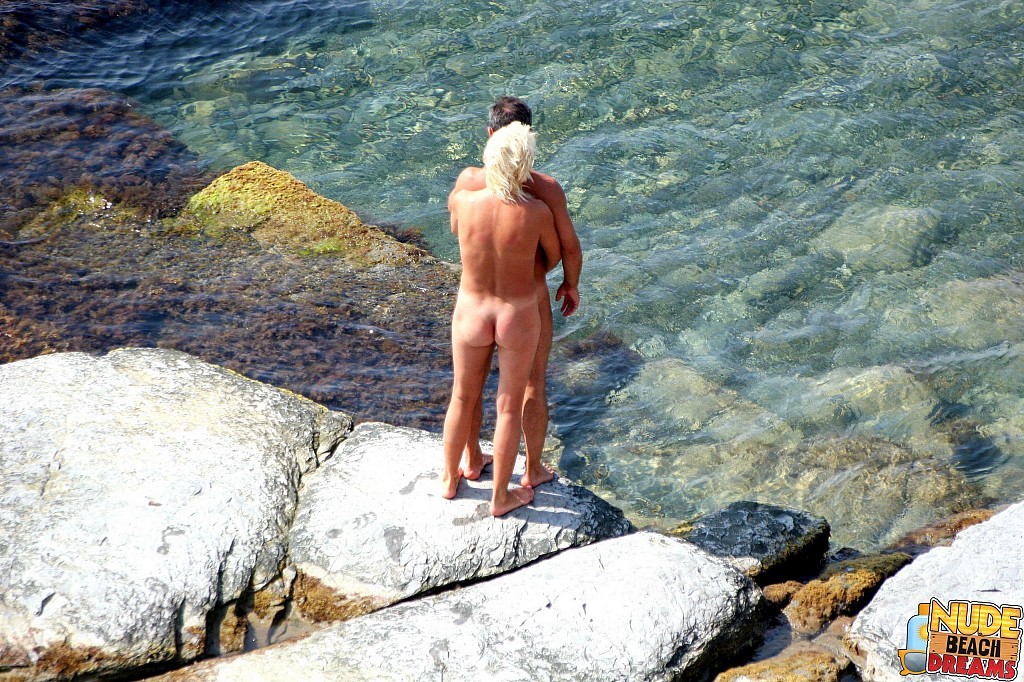 Totally naked couples enjoy on the beach #67306620