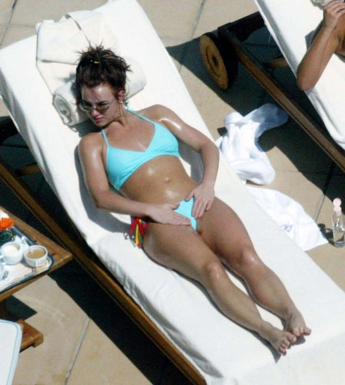 Britney Spears posing in topless and beach paparazzi pictures #75440929