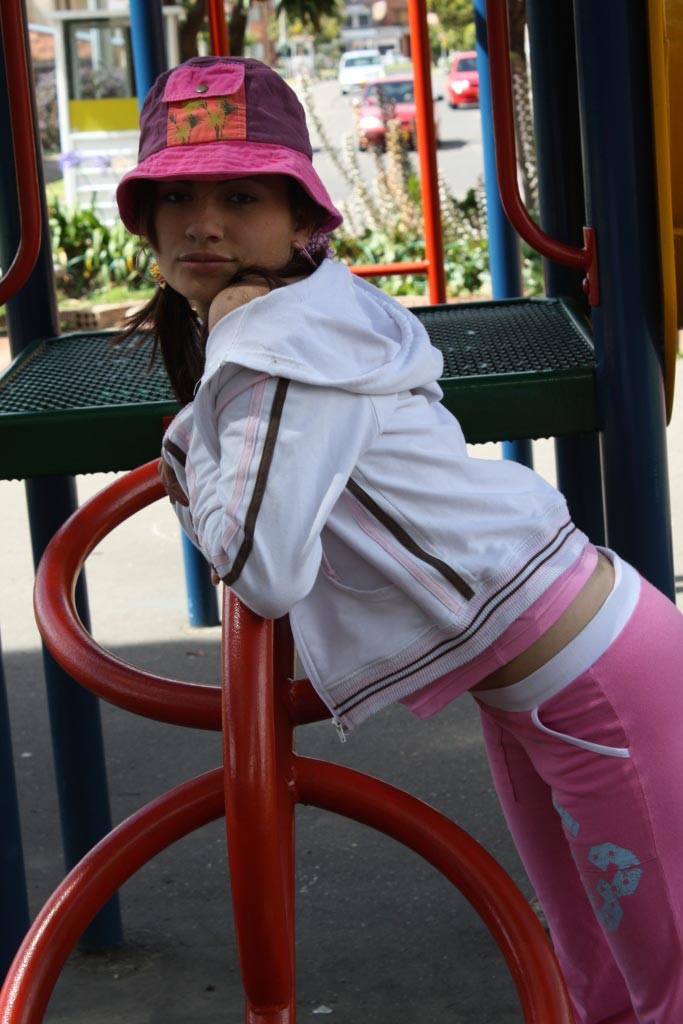 Latina teen girl at public playground #77948696