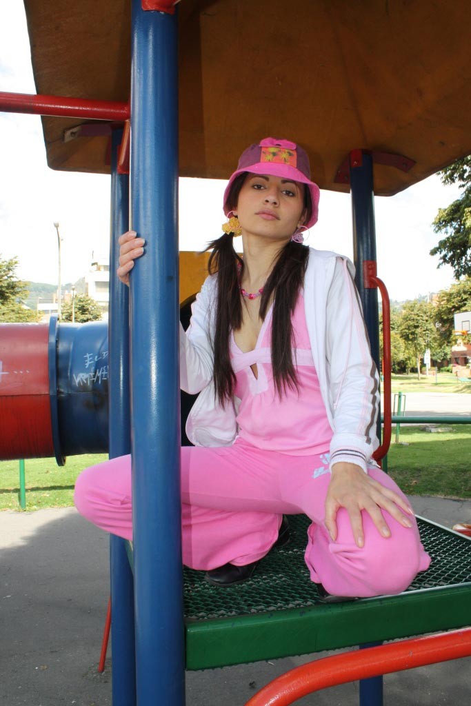 Latina teen girl at public playground #77948712