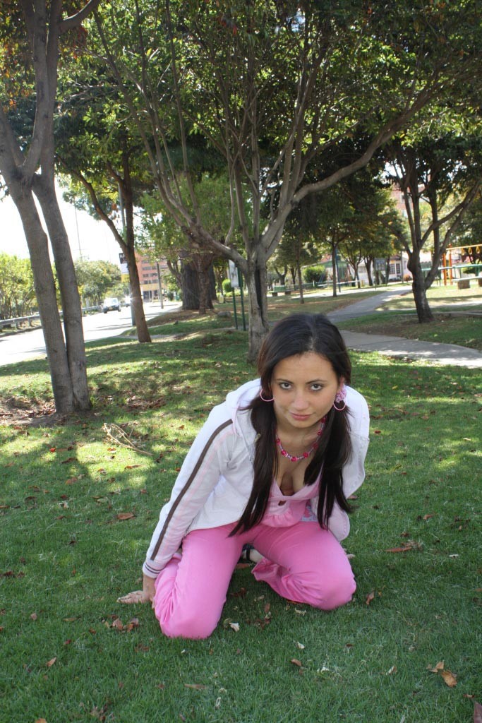 Latina teen girl at public playground #77948762