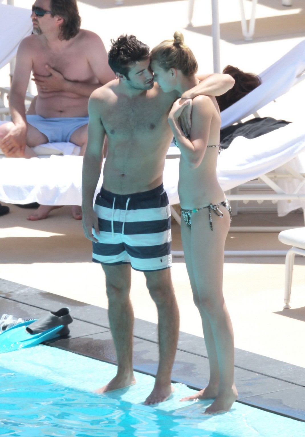 Emily VanCamp in snake print bikini petting with her boyfriend poolside in Monac #75259963