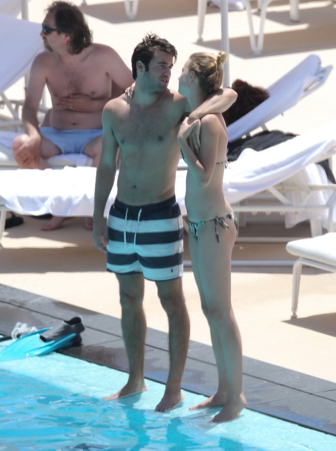 Emily VanCamp in snake print bikini petting with her boyfriend poolside in Monac #75259982