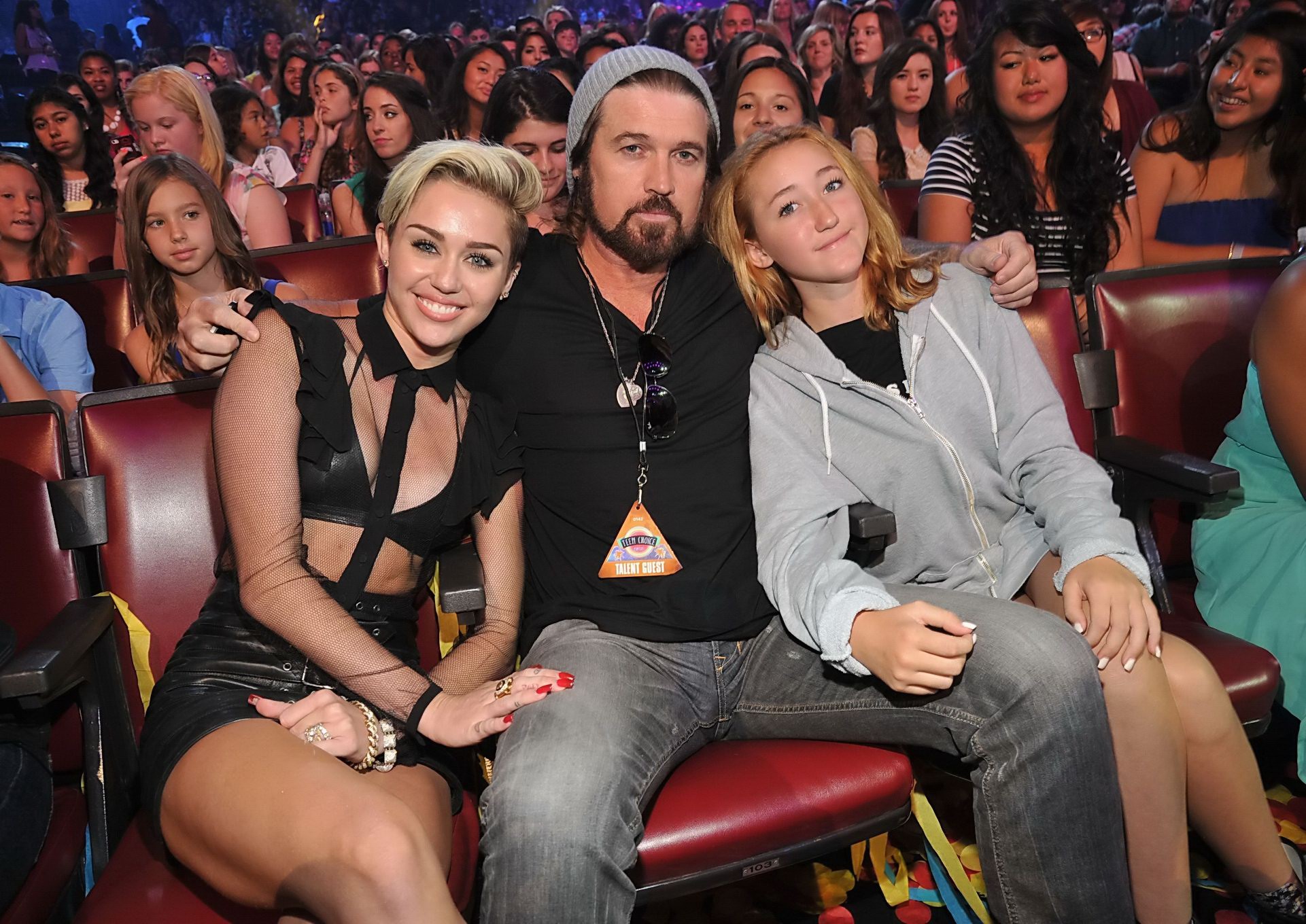 Miley Cyrus wearing black leather bra and mikro skirt at 2013 Teen Choice awards #75222033