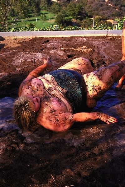 Two fat whales wrestling in mud #75588222