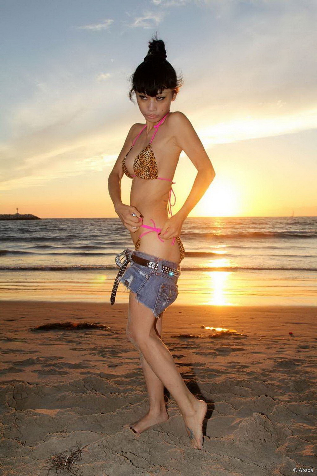 Bai Ling showing boobs in a seethru belly top and tiny leopard print bikini duri #75184396