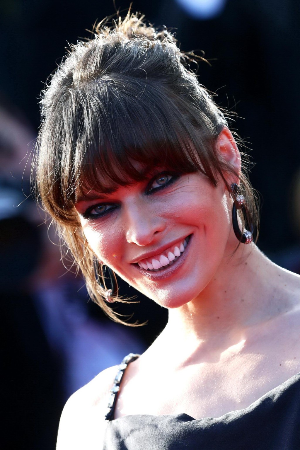 Milla Jovovich braless showing side boob at the 'Cleopatra' premiere in Cannes #75231785