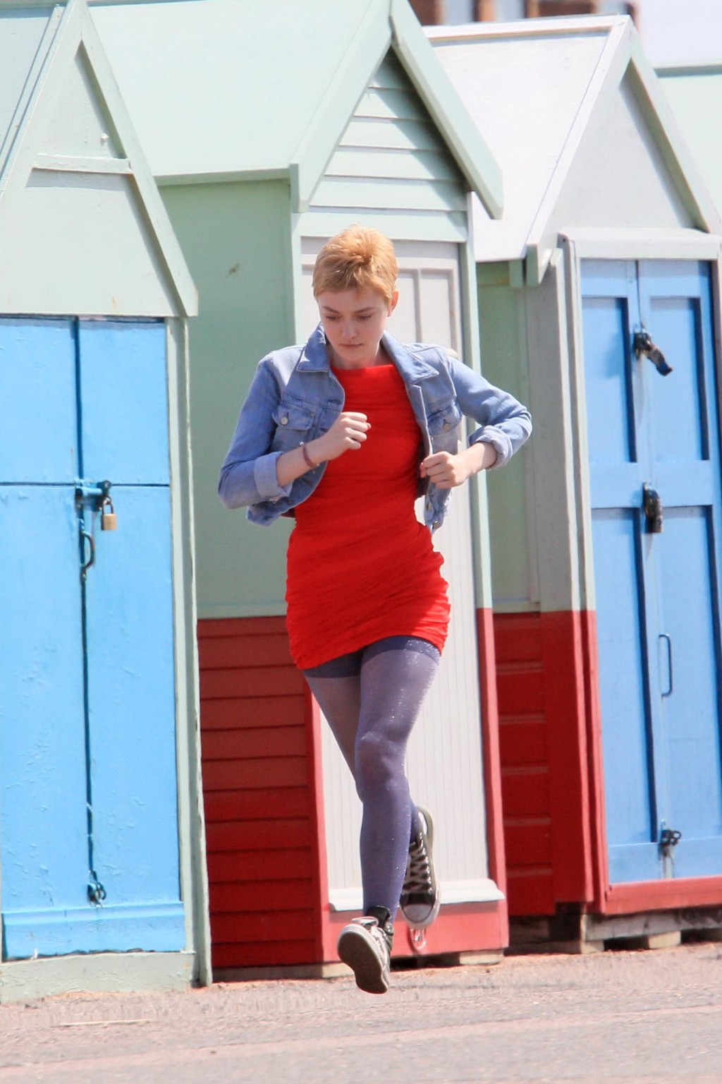 Dakota Fanning running in stockings on the 'Now Is Good' set #75294298