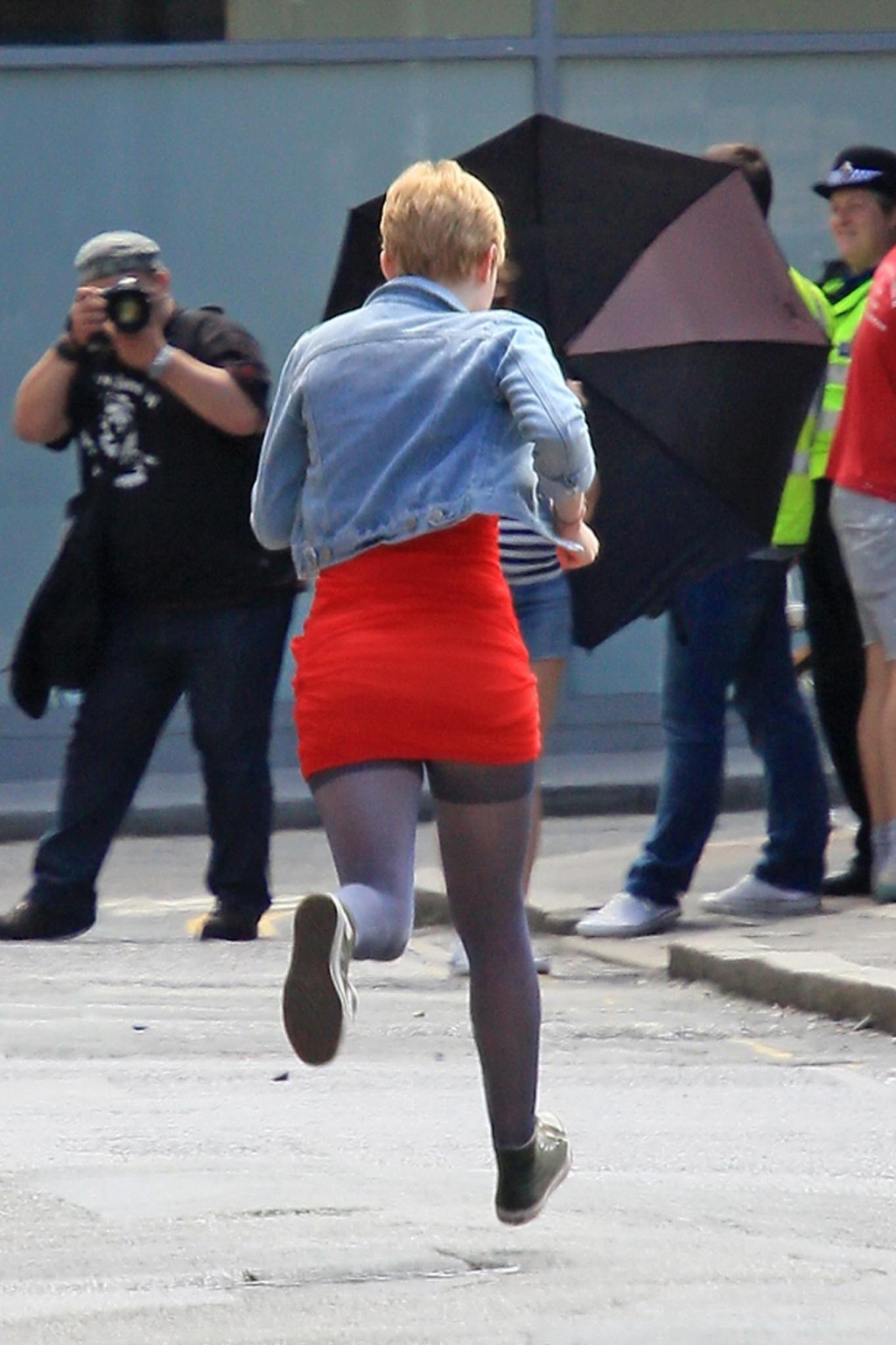 Dakota Fanning running in stockings on the 'Now Is Good' set #75294320